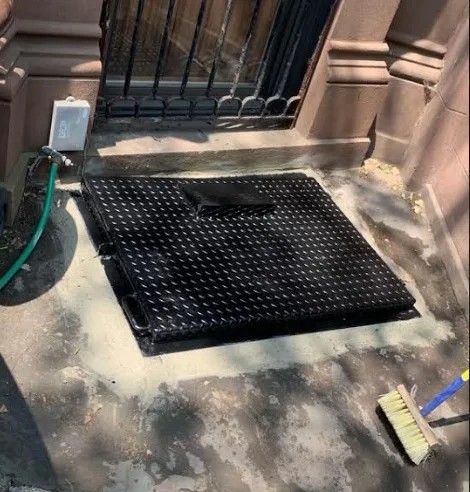 Custom cellar door installation by Steel Masters NYC — Brooklyn NY Kings County project