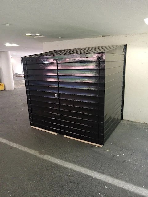 Economaster steel trash bin enclosure installed at Brooklyn NY multi-family residential property